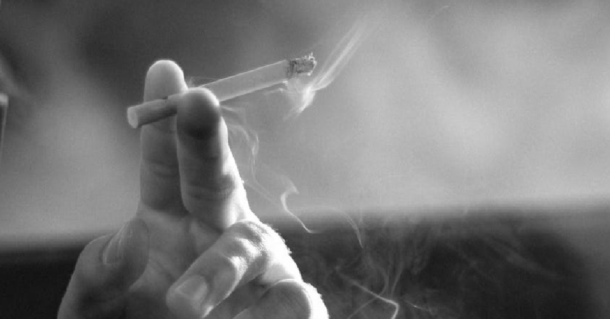 MAN NOT HAPPY WITH SMOKER SMOKING UNDER SHELTER BECAUSE IT WAS RAINING