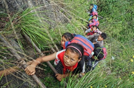 Kids Climb 2,600-High Clift To Attend School