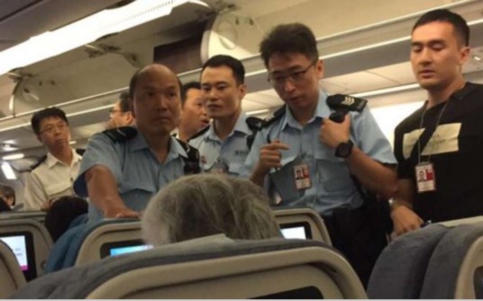 PRC woman arrested for throwing orange juice at Cathay Pacific flight attendant