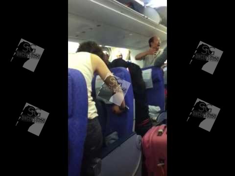 Mad PRC “LET ME OUT OF THE PLANE FOR EVERYONE’S SAFETY” (VIDEO)