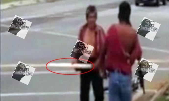 Uncle swings wooden plank at worker. Fight at Race Course Rd(Video)