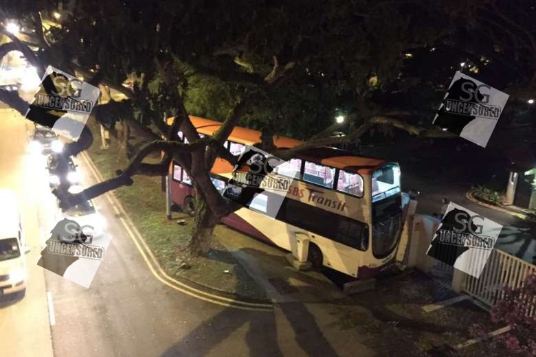 SBS bus 197 mount kerb and crash into wall at Bedok 