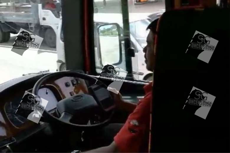 Bus Driver Caught Smoking and Using his phone while driving(Video)