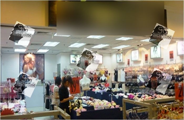 Man standing outside lingerie shop staring at shoppers!!