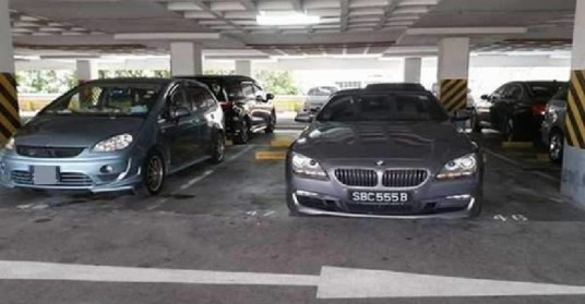 INCONSIDATE BMW DRIVER TOOK UP TWO LOTS DURING LUNCHHOUR!