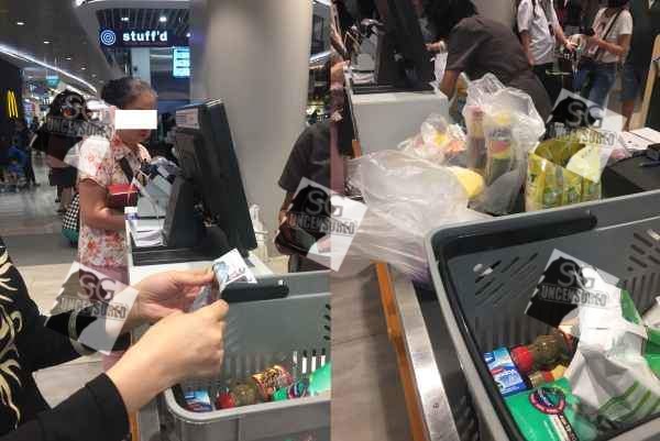 Inconsiderate auntie wraps everything in plastic bags like gifts and hold up queue at NTUC