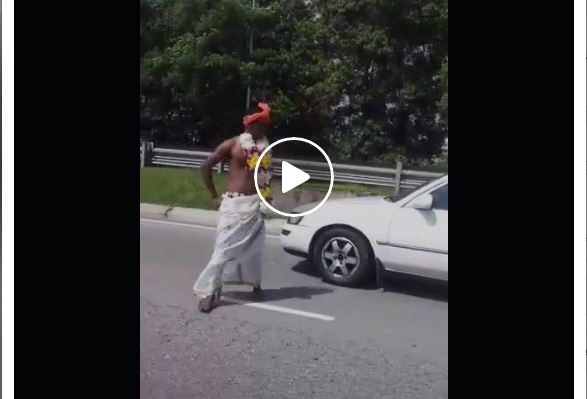 BEWARE! DO NOT STOP YOUR VEHICLE FOR THIS CLOWN IN MALAYSIA!!!!(VIDEO)
