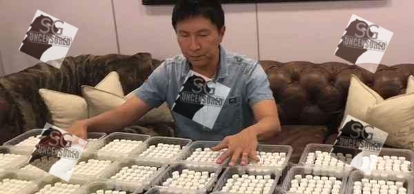 KONG HEE POST VIDEO PRAYING WITH BOTTLES OF OIL.