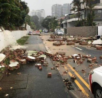 STEVENS ROAD STRIKE BY LIGHTNING. BRICKS FLY! ROAD OBSTRUCTED!
