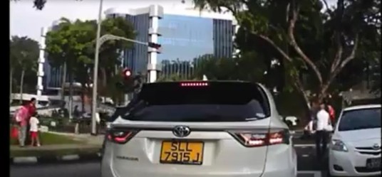 JB BIKER FLIES IN THE AIR AFTER CRASHING HEAD ON INTO TOYOTA VIOS AT SERANGOON! (VIDEO)