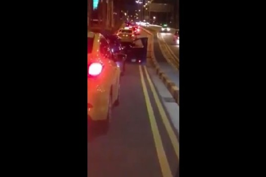 LOOK AT THIS TAXI AT CHANGI AIRPORT. WHY THE DOOR OPEN?