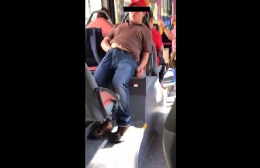 GUY APPEARS TO BE “SELF PLEASURING” IN PUBLIC BUS (VIDEO)