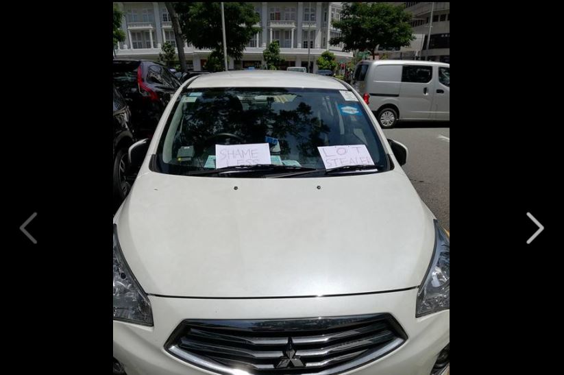 NETIZEN PLACE “SHAMELESS” & “LOT STEALER” ON WOMANS CAR AFTER HIS LOT STOLEN!!