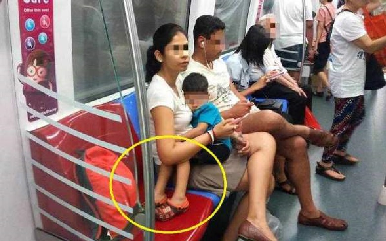 SELFISH WOMAN OCCUPIED RESERVED SEAT SO HER SON CAN REST HIS FEET