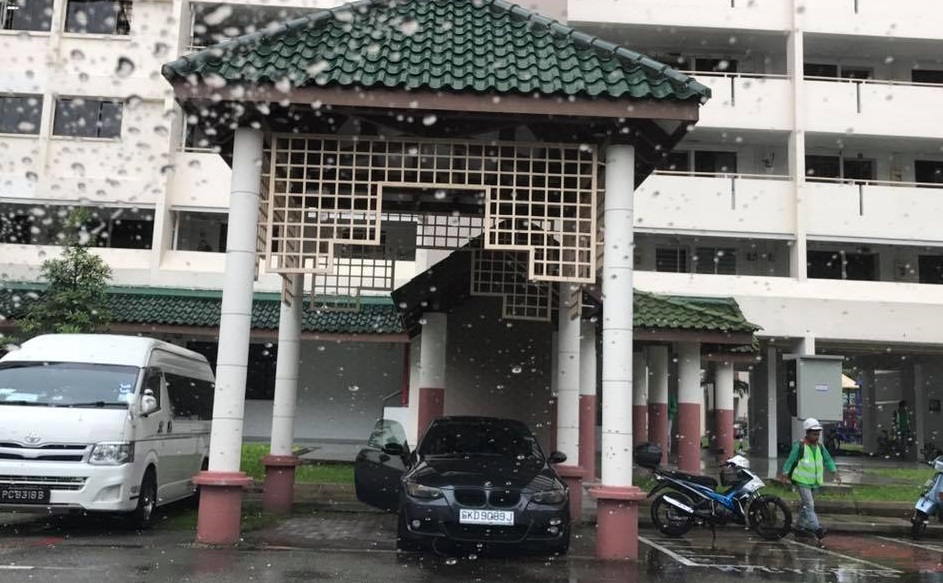 BMW DRIVER PARKS AT NO PARKING ZONE AT BEDOK NORTH TO SMOKE!