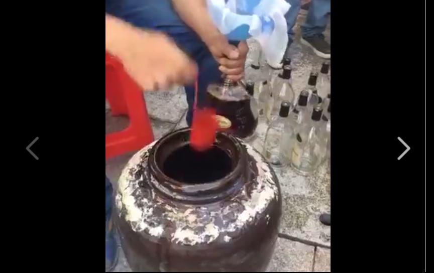 TRAVELERS BEWARE! FAKE LIQUOR MADE AT HOME. LOOKS LIKE FAKE HENNESSY AND MARTELL(VIDEO)