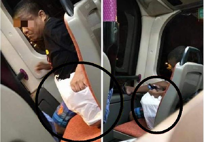 COMMUTER ON BUS 168 SHOWS ATTITUDE AFTER HIS PLASTIC BAG HAVE TO LET OTHER PASSENGER SEAT!!!