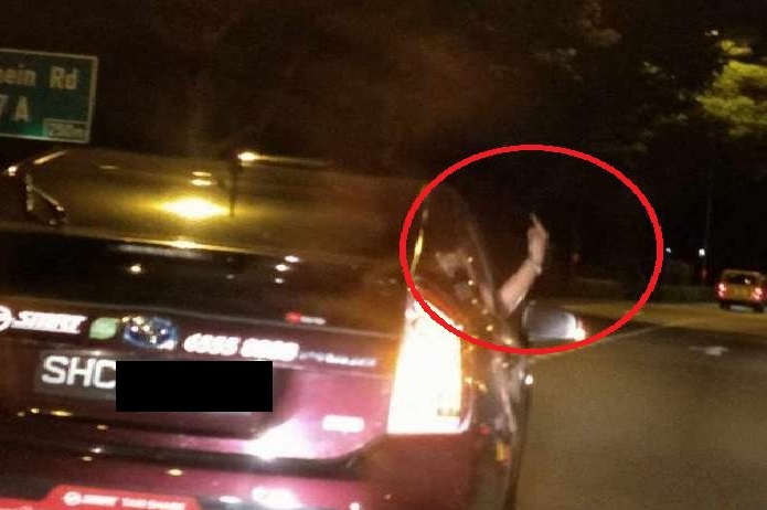 CAB DRIVER ABRUPT LANE CHANGE SHOWN MIDDLE FINGER @ DRIVER AFTER BEING HONK!