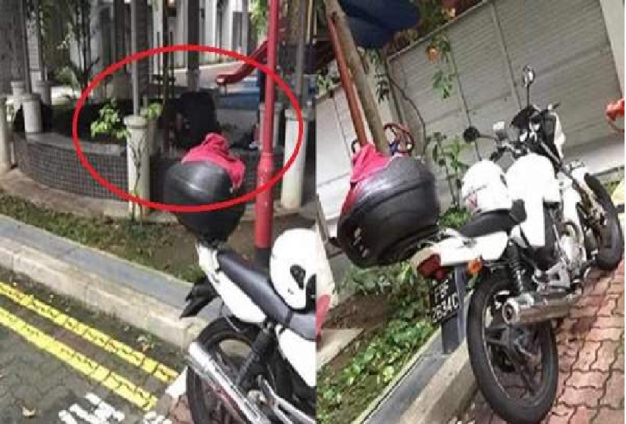 LTA OFFICER CAUGHT SLEEPING. NEARBY BUS BLOCKING ENTRANCE