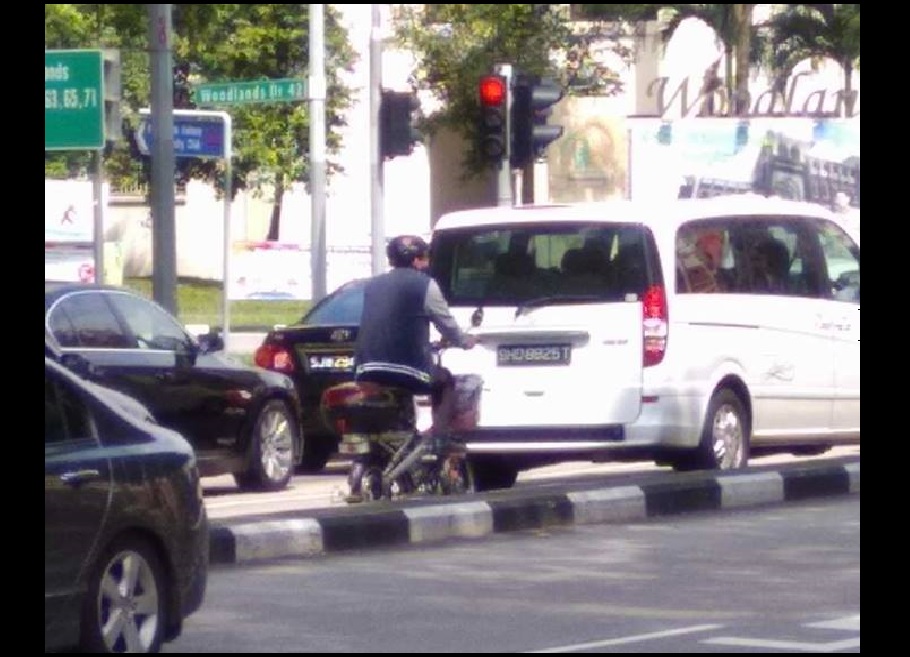 E-BIKER THINKS HIS A MOTORCYCLE AT WOODLANDS AVE 4!