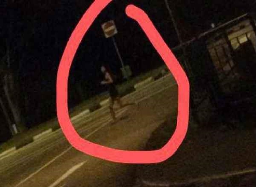 BEWARE! WOMAN RUNS TOWARD ONCOMING CAR AT YIO CHU KANG (VIDEO)