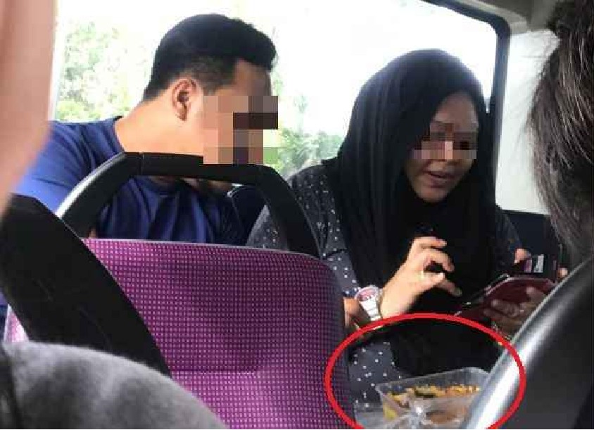 FAMILY EATING IN SMRT BUS LIKE NOBODY BUSINESS