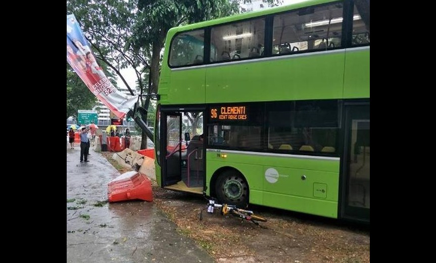 ACCIDENT AT CLEMENTI BUS 96 SKIDDED. WET WEATHER?