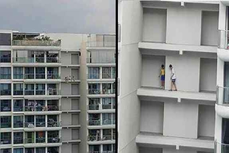 BOYS WALKING ALONG LEDGES AT SENGKANG.