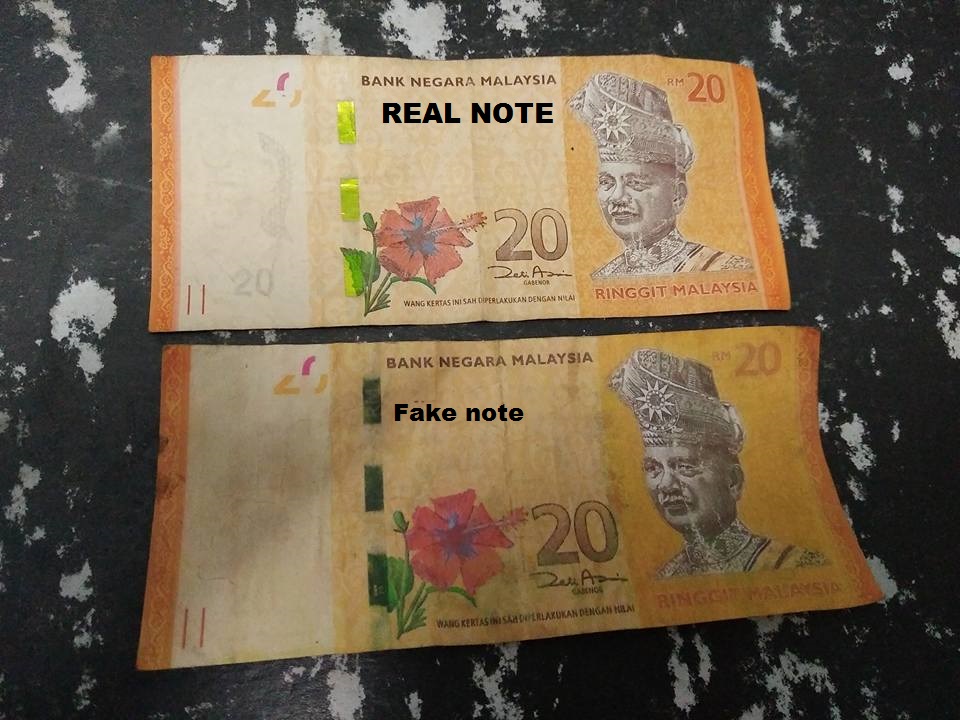 BEWARE OF FAKE MALAYSIAN CURRENCY CIRCULATING BETTER DOUBLE CHECK BEFORE ACCEPTING!
