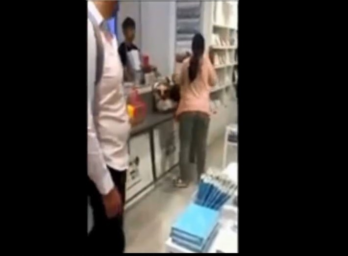 STRESSED WOMAN SHOUTS AT ION ORCHARD CASHIER! (VIDEO)