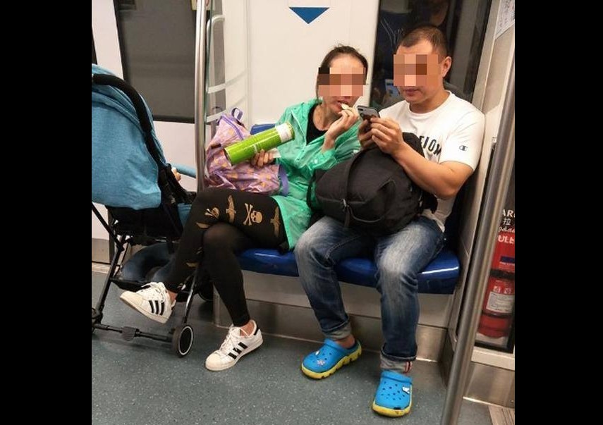 PRC FAMILY ENJOYING SNACK TIME IN MRT. BLOODY FOREIGN TALENT