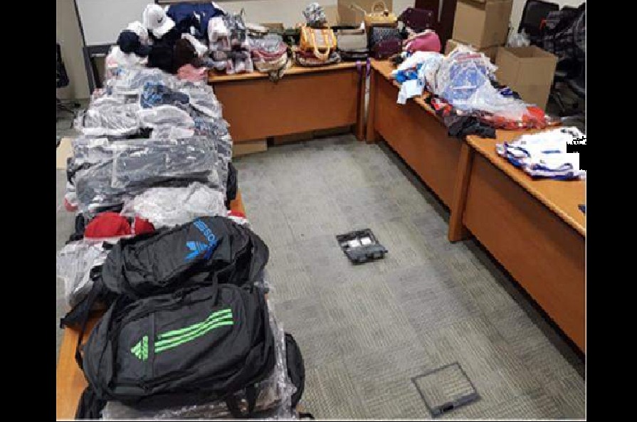 MAN ARRESTED AFTER IMPORTING 318 COUNTERFEIT BRANDED BAGS
