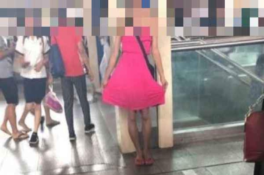 DISTURBING MAN IN PINK DRESS. ASK PASSERBYS IF HE IS CHIO?!?!?