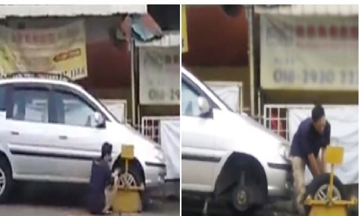MALAYSIAN MAN PROCEED TO REMOVE WHEEL CLAMP BY HIMSELF! THUGLIFE!