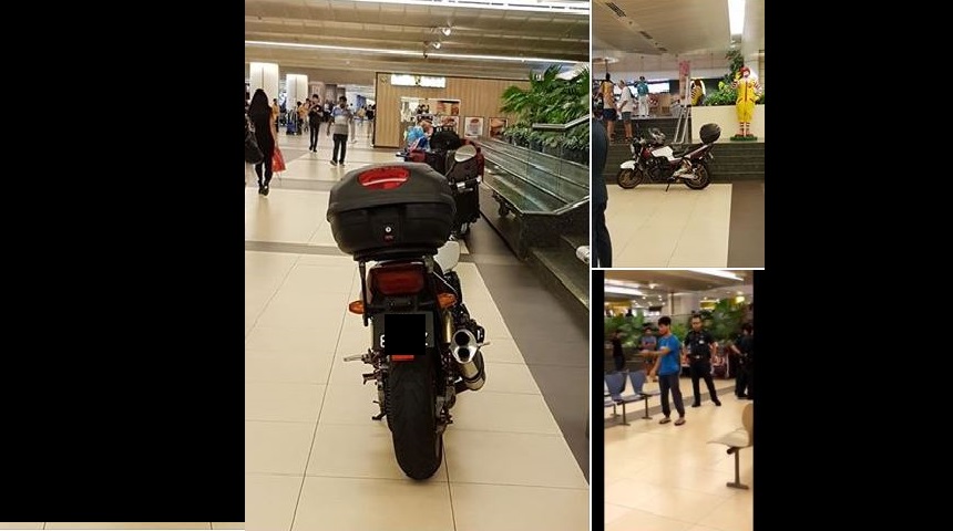 MOTORCYCLIST PARKS HIS MOTORCYCLE OUTSIDE MCDONALD’S AT CHANGI AIRPORT!!