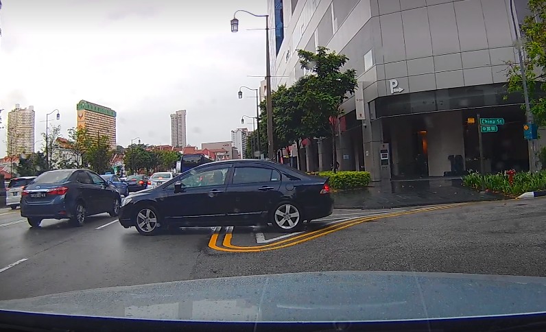 CAR GOES AGAINST TRAFFIC AT CHINA STREET