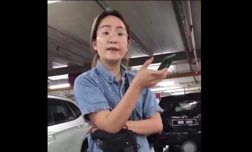 M’SIA WOMAN “CHOPPED” CAR PARK SPACE BY STANDING ON IT.