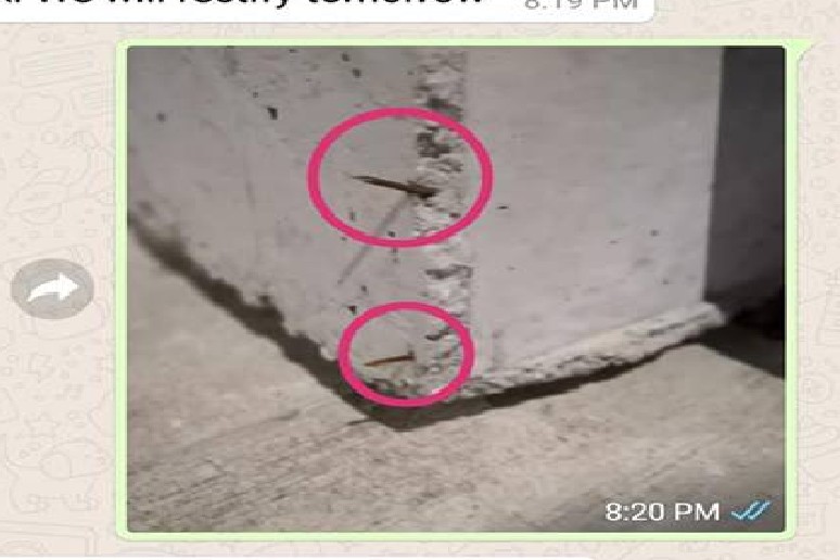 NAILS POKING OUT AT PAVEMENT AT ANG MO KIO AVE 4