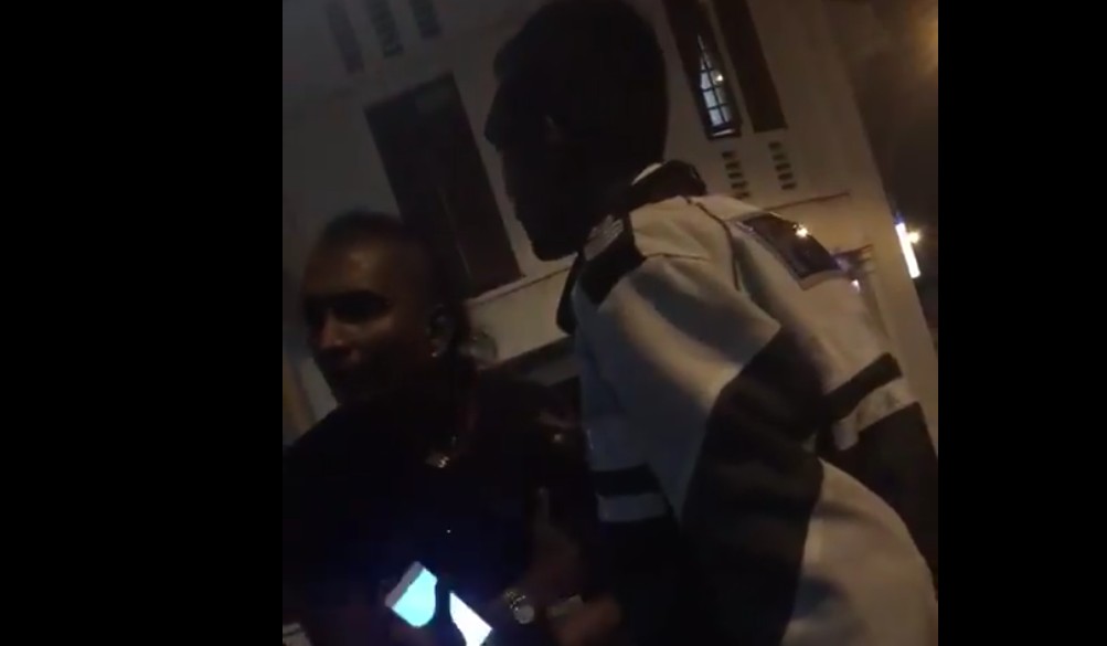 ARGUMENT WITH POLICE. VIDEO TAKER CALLS “HIM A GANGSTER”