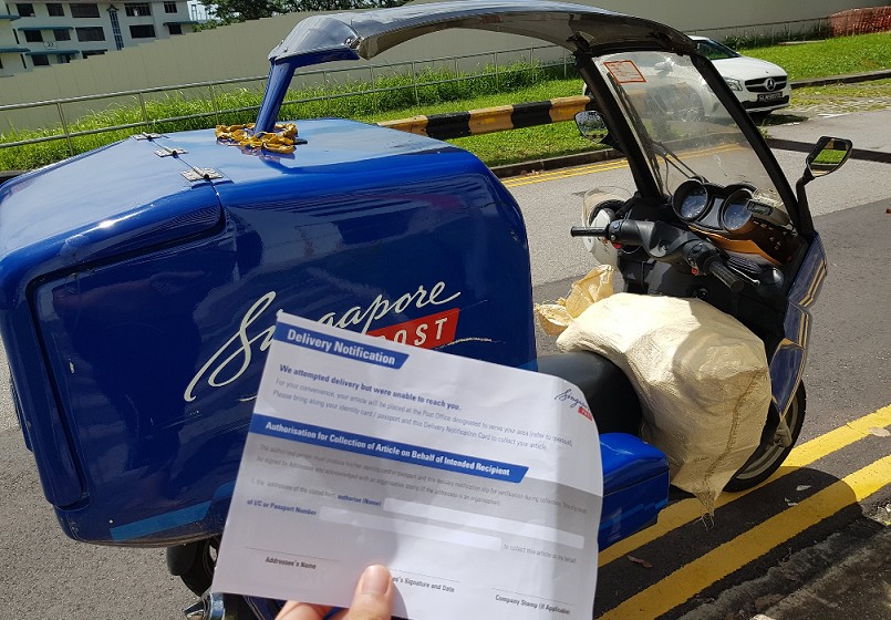 SING POST DELIVERY GUY KNOCK FEW SECONDS AND WENT OFF