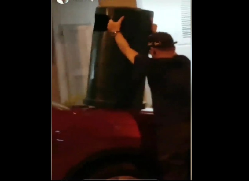 PUNK DESPERATE FOR ATTENTION, PLACES RUBBISH BIN ON CAR