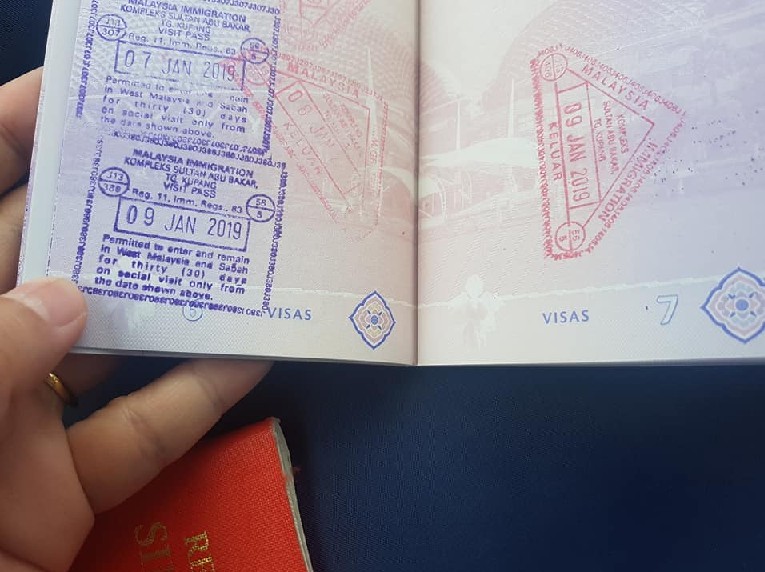 CHECK PASSPORT WHEN GO JB! 2 OUT OF 3 PASSPORTS GET CHOPPED