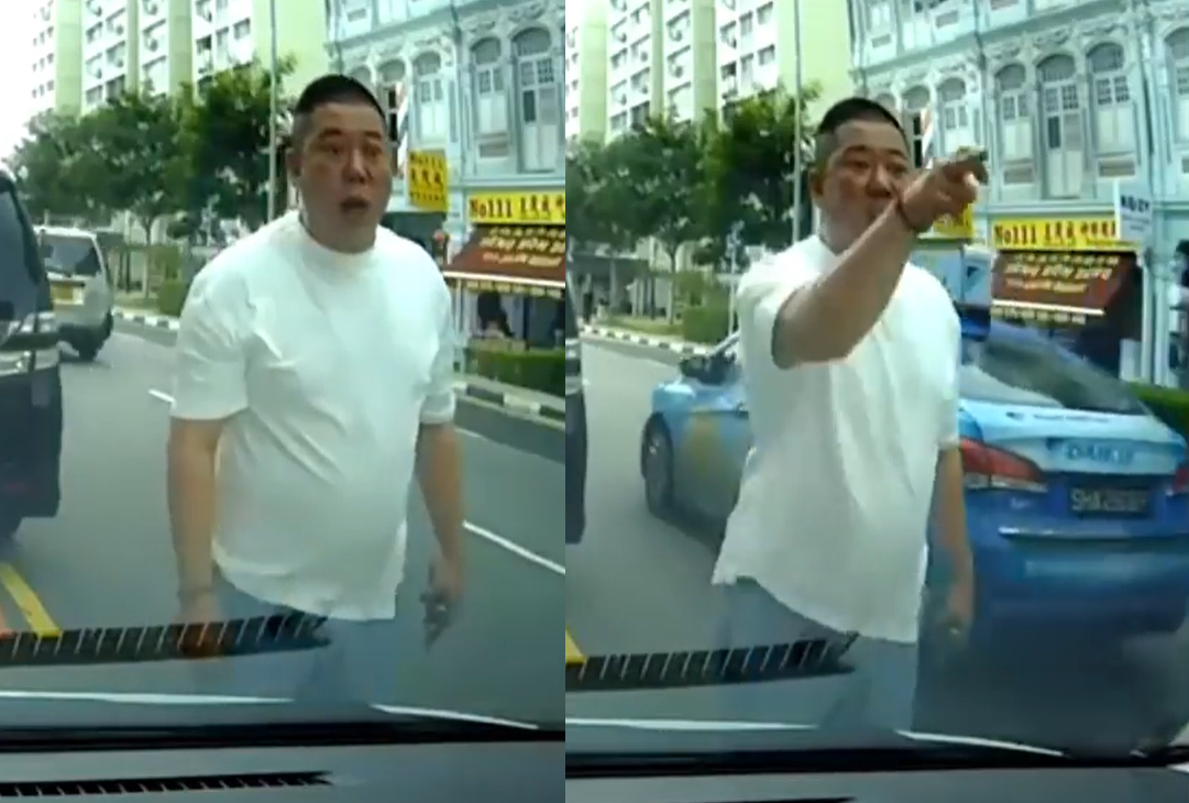 MAN BLOCKS TRAFFIC AT JALAN BESAR TO POINT MIDDLE FINGER