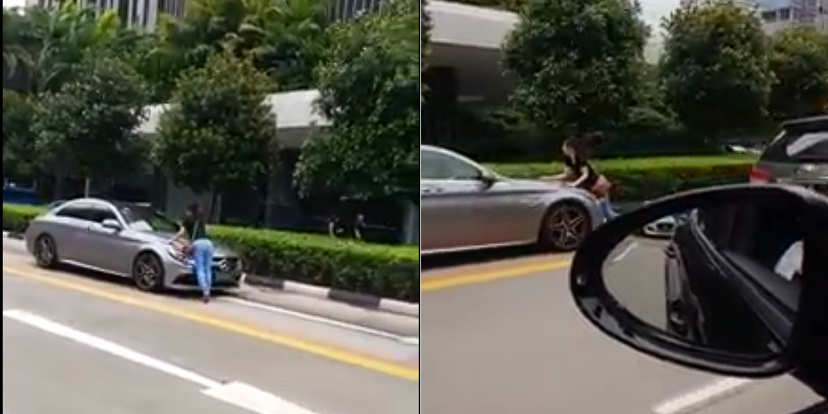 WOMAN SEEN BLOCKING A MERCEDES ALONG NORTH BRIDGE ROAD