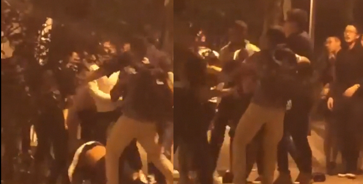 YOUNG PUNKS FIGHTING IN PUBLIC, MORE THAN 10 PEOPLE INVOLVED