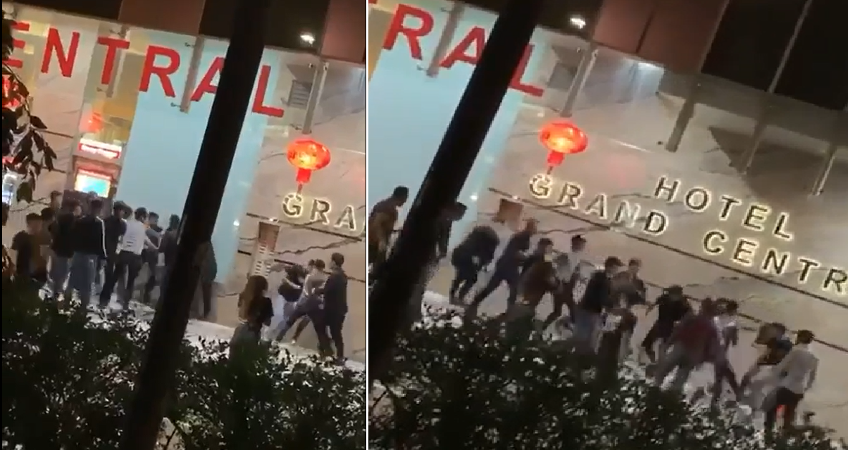 GANG FIGHT OUTSIDE HOTEL GRAND CENTRAL AT NIGHT, 20 PEOPLE INVOLVED