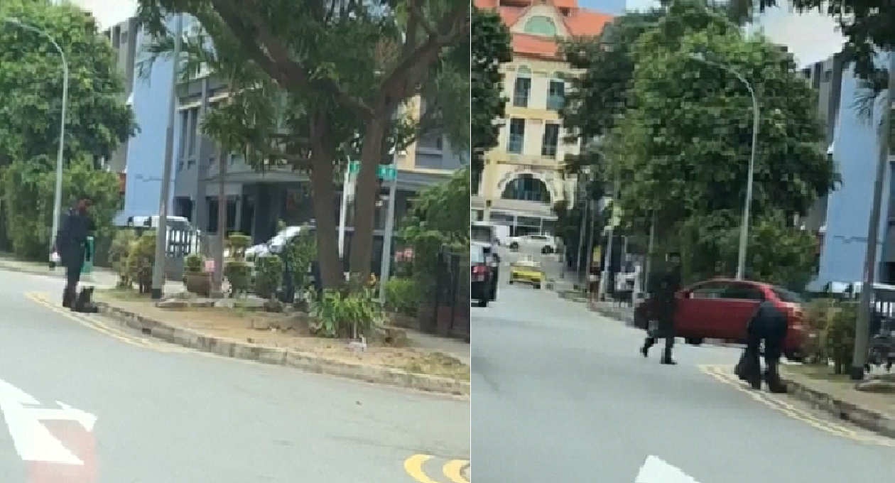 OFFICERS OPENING UP DRAINS AT GEYLANG LORONG 12 FOR HIDDEN CONTRABAND