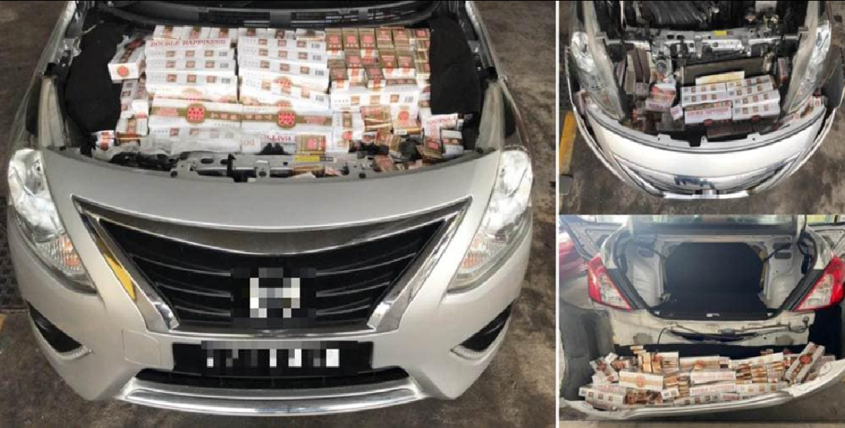 M’SIAN VEHICLES CAUGHT WITH 634 CARTONS & 3,818 PACKS OF CONTRABAND @ WOODLANDS