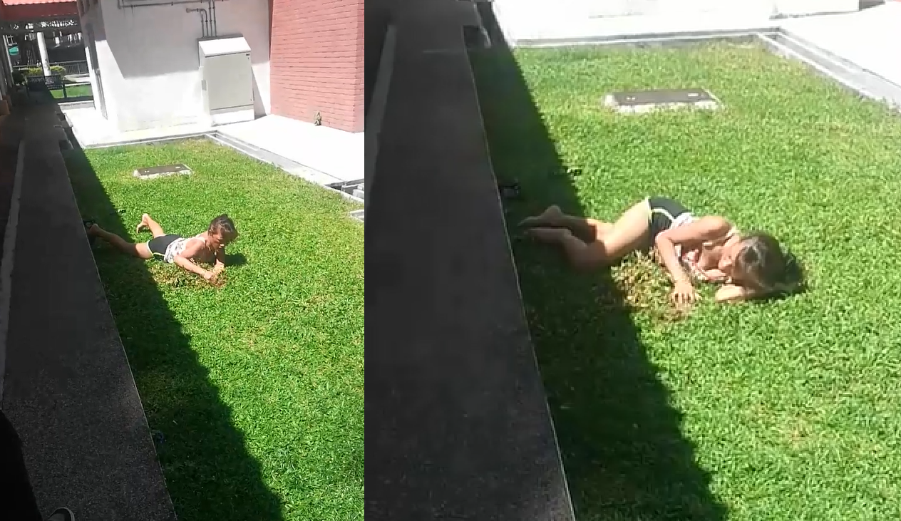 WOMAN DIGGING AND EATING GRASS AT CIRCUIT ROAD ALJUNIED.