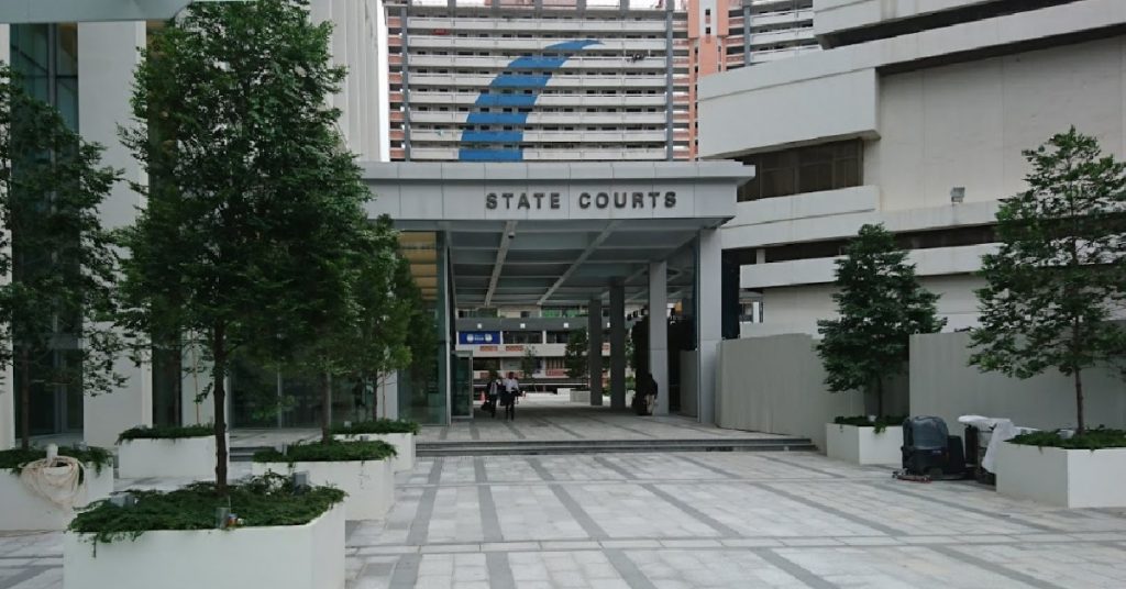 TWO MEN CHARGED AFTER HELPING TRADING SCAMMER TO ESCAPE FROM SINGAPORE